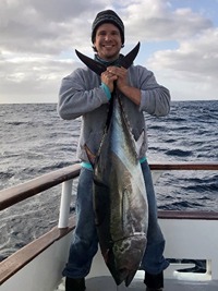 Armand Barilotti holding a tuna