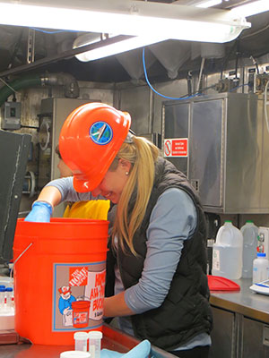 Leslie removes coral for storage in the fresh water tanks