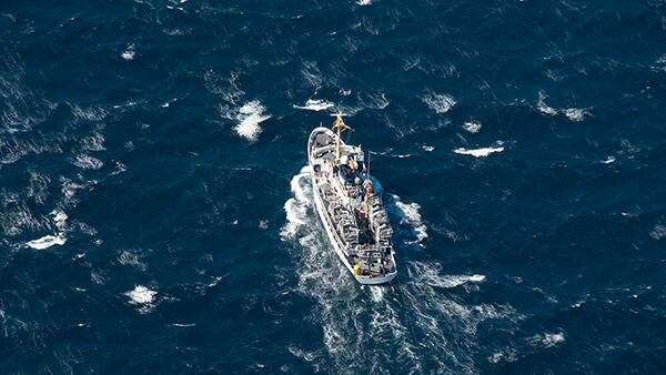 aerial view of a boat in open water